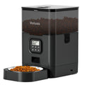 Automatic pet feeder with dual power supply showcasing a digital timer and dry kibble storage.